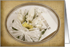 Wedding-daisy bouquet on a Holy Bible with gold frame card