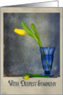 Yellow tulip in blue glass for sympathy card