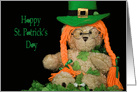 St. Patrick’s Day teddy bear with hat and orange braids in shamrocks card