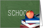 Back to School with apple on books with green chalkboard. card