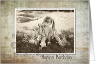 little girl blowing bubbles for birthday card