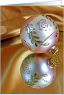 Christmas ornament on mirror with gold satin card