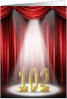 102nd Birthday in stage spotlight and red curtains card