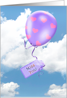 Miss You, purple balloon floating with pink hearts in clouds with tag card