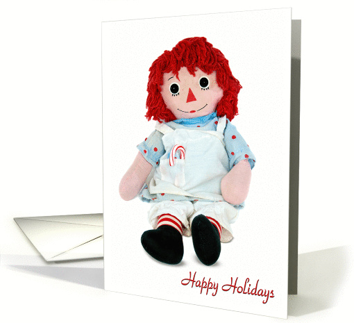 Happy Holidays-old rag doll with candy cane isolated on white card