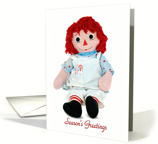 Season's Greetings-old rag doll with candy cane isolated on white card