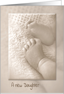 New Daughter Congratulations baby feet on soft blanket in sepia tone card