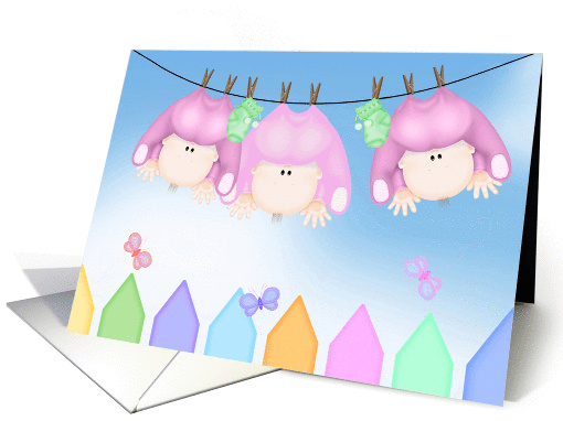 birth announcement of triplet girls hanging on clothesline card