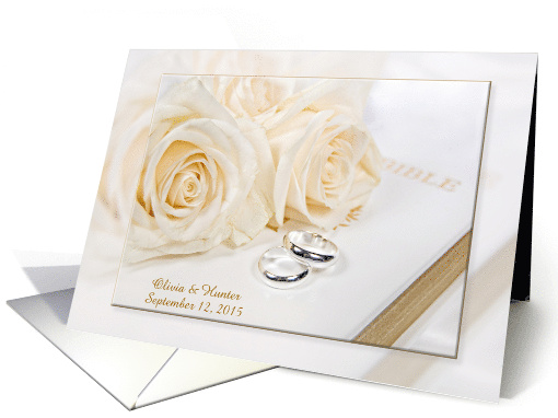 Wedding Rings and Roses on White Bible with Newlywed Names card