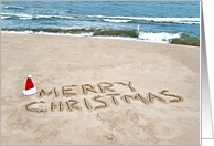 Brother’s Christmas, Merry Christmas text in beach sand with Santa hat card