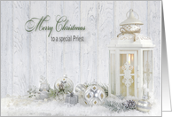 Priest’s Christmas white candle lantern with ornaments in snow card