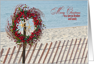 Brother and family Christmas berry wreath and starfish on beach fence card