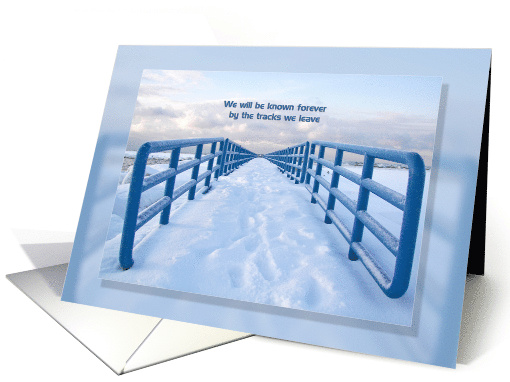 Footprints in snow on Lake Michigan pier with inspirational quote card