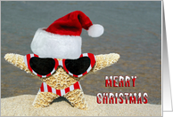 Christmas starfish with striped bikini and sunglasses on the beach card