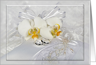 White Orchid Blossoms With Silver Wedding Rings for Congratulations card