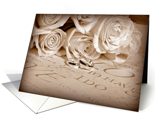 wedding rings with rose bouquet with sepia frame card (623447)