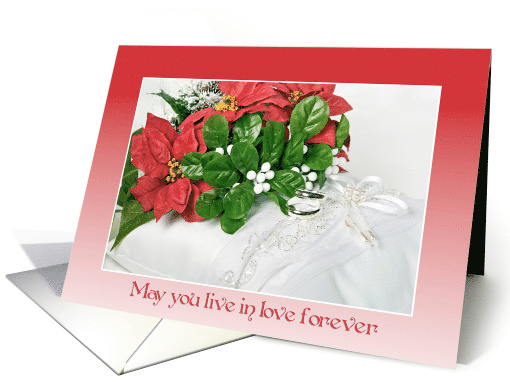Christmas wedding poinsettia bouquet and rings on satin pillow card