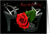 Valentine red rose with silver high heels on black. card