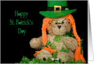 St. Patrick’s Day teddy bear with hat and orange braids in shamrocks card