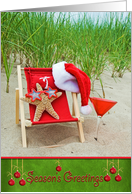 Season’s Greetings with starfish in beach chair with cocktail card