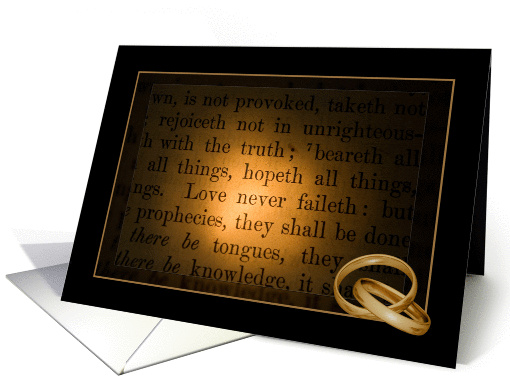 gold wedding rings on Bible verse with dark vignetting card (872708)