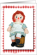 rag doll on barrel with gingham frame for thank you card