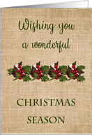 Rustic Christmas Greetings With Holly and Berries on Burlap Background card