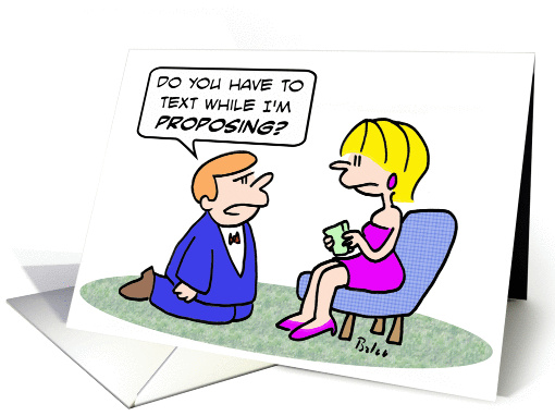 Girl texts while guy proposes. Will you marry me? card (885679)