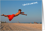 Encouragement, boy leaping on beach card