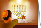 Thanksgivukkah, a boy looking at pumpkin & candles on menorah card