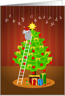 a little mouse puts a star on top of the christmas tree card