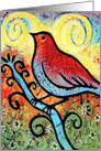 Red bird on a branch in spring card