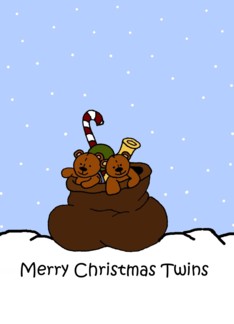 Twin bears in Santas...