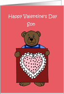 boy Bear holding a valentine for his son card