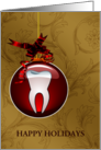 Hanging Red Ornament with Tooth Inside on Gold Back Happy Holidays card