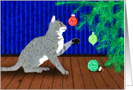 Gray Striped Cat Playing with a Christmas Tree Ornament card