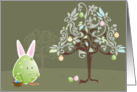 Egg Bunny character outside with an Easter egg tree card