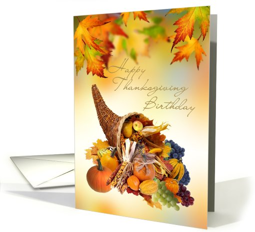 Birthday on Thanksgiving day card with Cornucopia and leaves. card