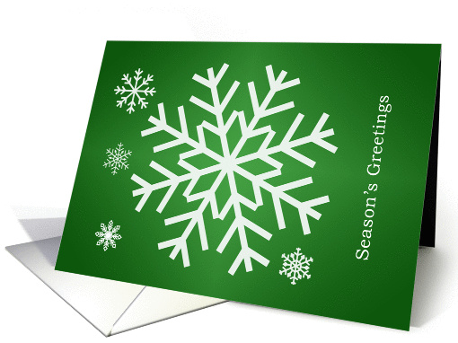 Season's Greetings Christmas card - white snowflakes on green card