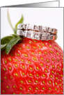 Wedding rings on strawberry card