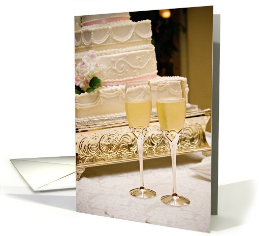 2 cups of Champagne next to cake card (417931)