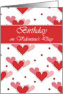 Birthday on Valentine’s Day, Three Red Pink and Rose Hearts card