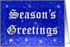 Season’s Greetings snowflakes on blue background card