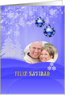 Custom Spanish Christmas card with snow fall and ornaments on blue card