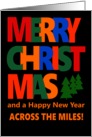 Merry Christmas Across the Miles with Colorful Text and Christmas Tre card