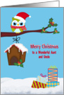 Christmas to Aunt And Uncle, Cute owl sitting on a tree limb, holly card