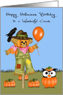 Birthday On Halloween to Cousin, Owl in a pumpkin patch, scarecrow card