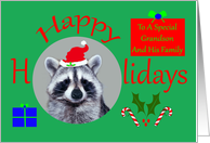 Happy Holidays To Grandson and Family, Raccoon wearing Santa Claus Hat with holly, presents, candy canes card