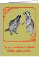 Anniversary for spouse, A raccoon staring into the eyes of another card