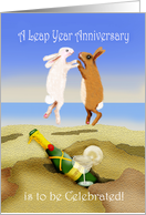 Leap year Anniversary, cartoon of two bunnies jumping.champagne. card